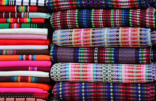 Shawls of different color in a market showroom