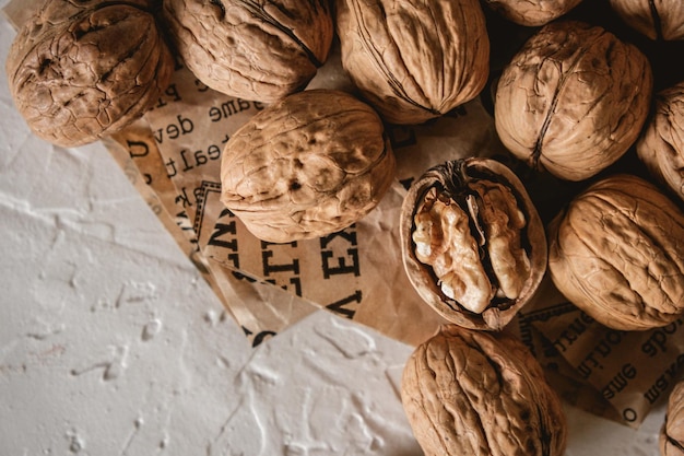 Shelled and unshelled walnuts official stuffing Fresh walnut background