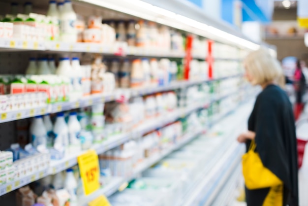 Shelves with milk products at grocery store