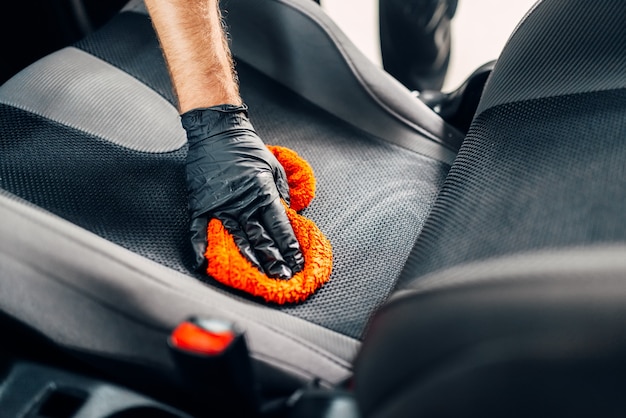 Сhemical cleaning of car seats with spoonge