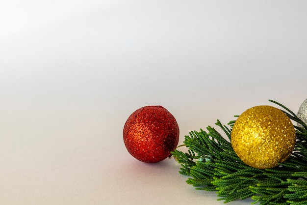 Shiny balls on christmas tree branch