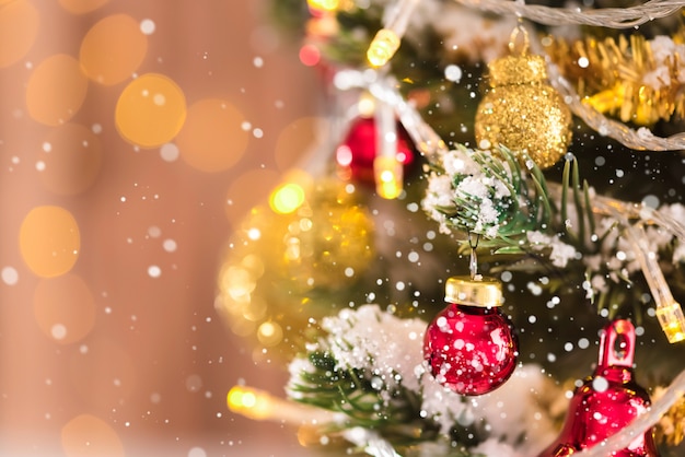 Shiny and glittering decorative ornaments on Christmas tree