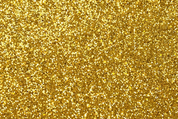 Photo shiny golden glitter festive background