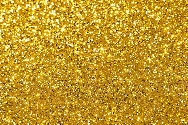 Photo shiny golden glitter festive background