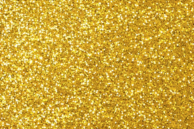 Photo shiny golden glitter festive background