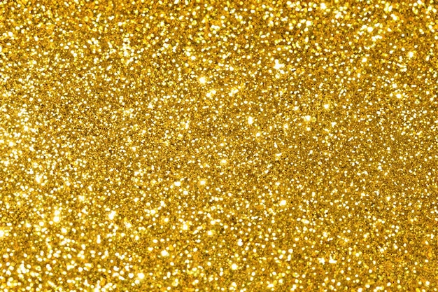 Photo shiny golden glitter festive background