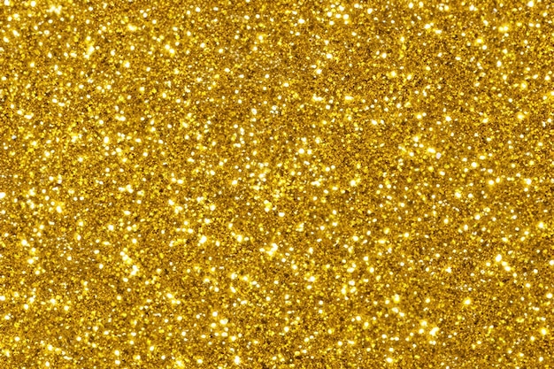 Photo shiny golden glitter festive background