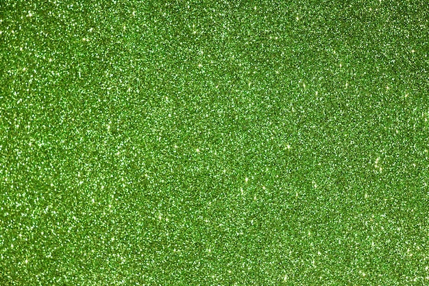 Shiny green foamiran background with glitter effect