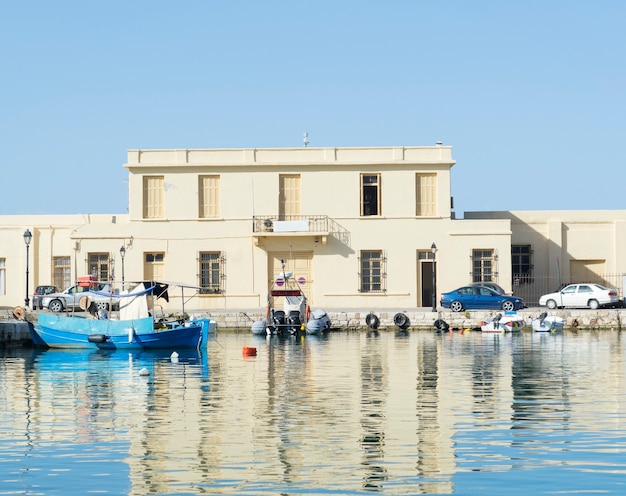 Ship in bay, Crete, Greece, on sunny day