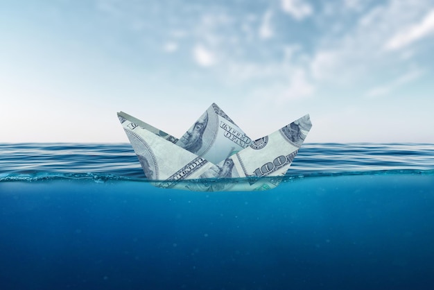 A ship made of dollar banknotes on the sea Concept of success and investment in business