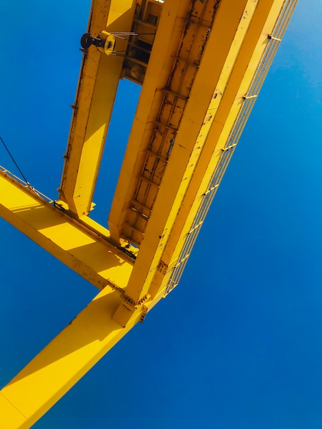 Shipping cargo to harbor by crane. 