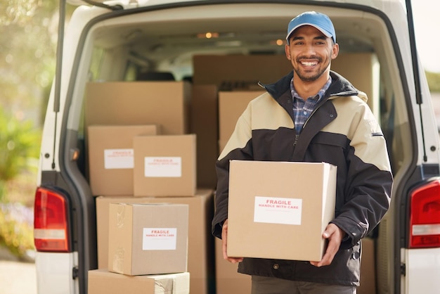 Shipping delivery and box with portrait of man by van for courier logistics and supplier Ecommerce export and distribution with male postman in vehicle for mail package and cargo shipment