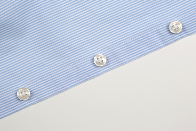 Of the shirt with buttons on white background