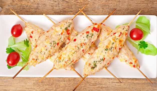 shish kebab of chicken with peppers and cheese