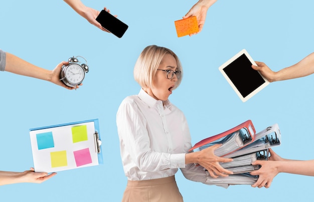 Photo shocked businesswoman taking folders multitasking concept collage