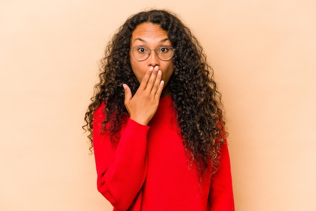 Shocked covering mouth with hands anxious to discover something new