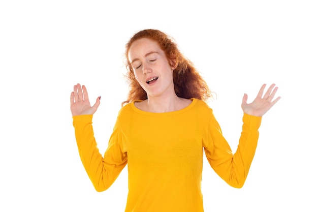 Shocked inssecure redhead woman raise hands surrender innocent isolated on a white background