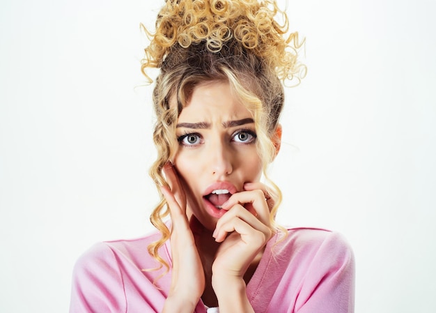 Shocked and surprised girl expressive facial expressions beautiful girl with curly amazed woman with