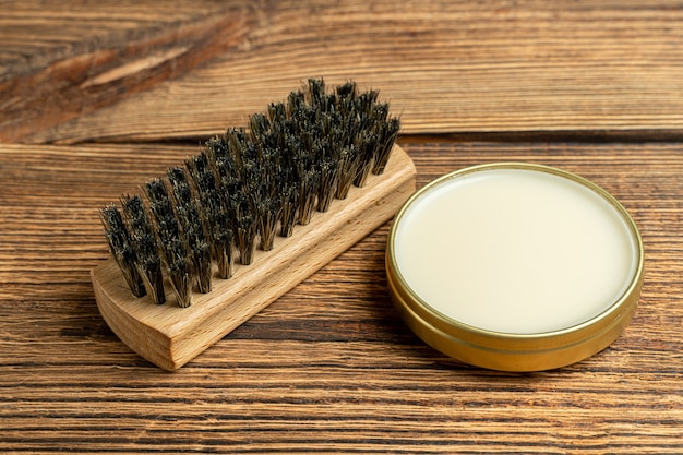 Shoe wax polish cream and cleaning brushes for leather boots care