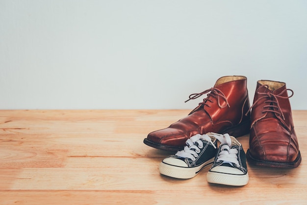 The shoes of father and son. concept father day