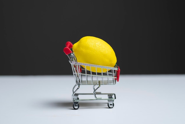 A shopping cart carrying a raw fruit concept of healthy eating