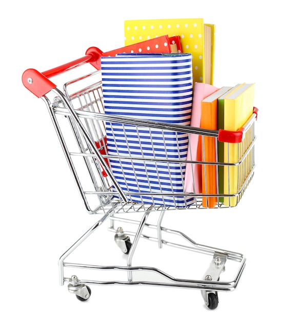 Shopping cart with books isolated on white