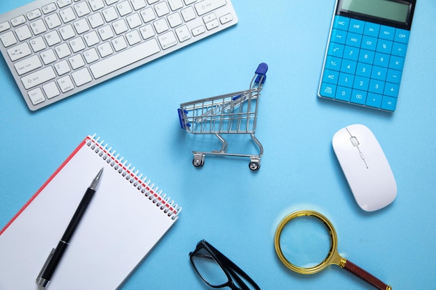 Shopping cart with a computer keyboard and business objects