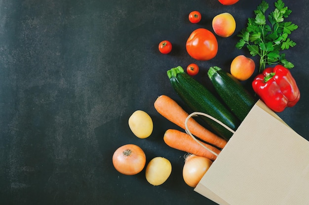 Shopping, delivery healthy food. Fresh vegetables, fruits, carrot, potato, zucchini in paper bag.