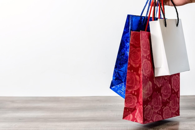 Shopping paper bags on a wooden table