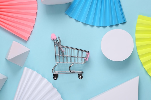 Shopping trolley on Abstract background with geometric shapes Minimalism Concept art Creative layout