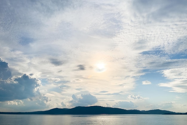 The shoreline of the river in the rays of the sun