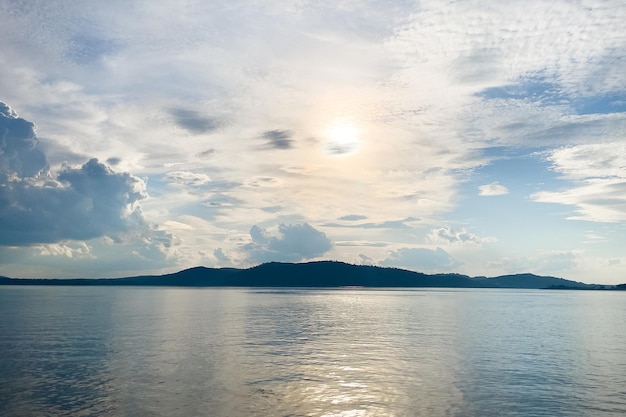 The shoreline of the river in the rays of the sun