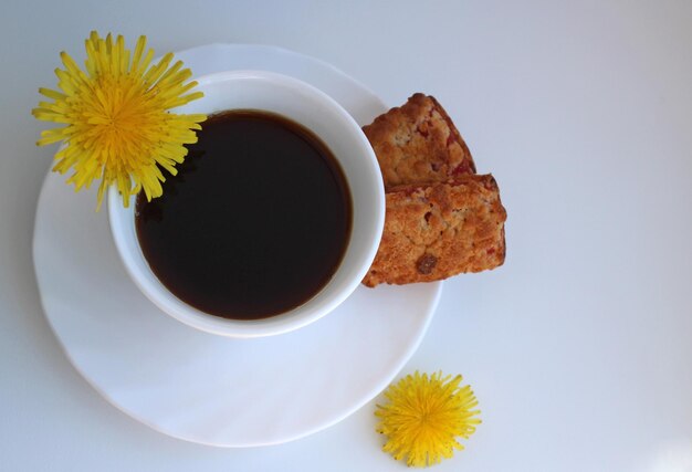 shortbread rectangular biscuits with jam with dandelion tea