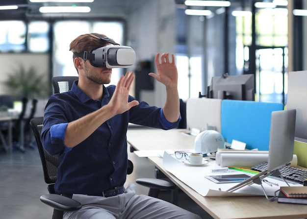 Shot of an engineer wearing a VR headset in an new building Change the way you see and experience the world