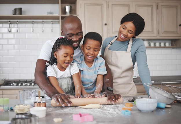 Shot of a family baking together in the kitchen