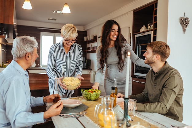 Shot of a family having a meal together around a dining table