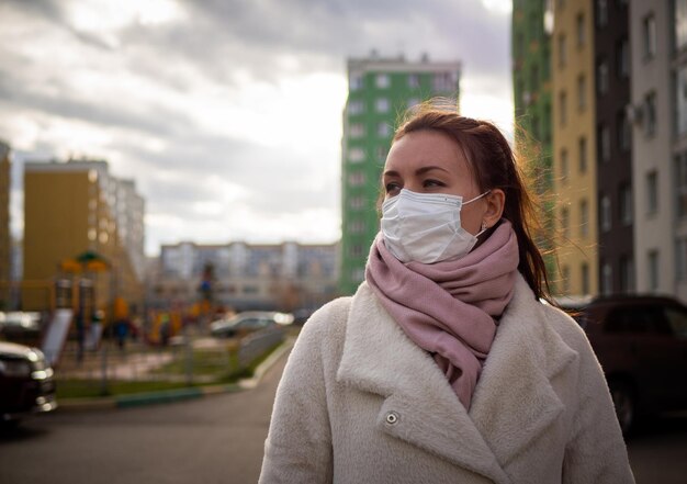 Shot of a girl in a mask on the street lockdown Covid19 pandemic