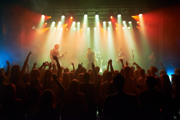 Shot of a large crowd at a music concert- This concert was created for the sole purpose of this photo shoot, featuring 300 models and 3 live bands. All people in this shoot are model released.