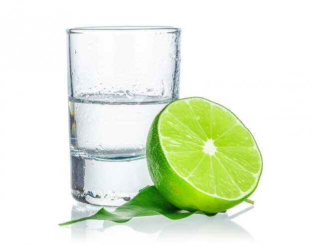 Shot of tequila with a slice of lime