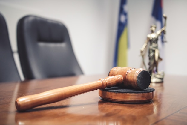 Shot of a wooden gavel in the court room