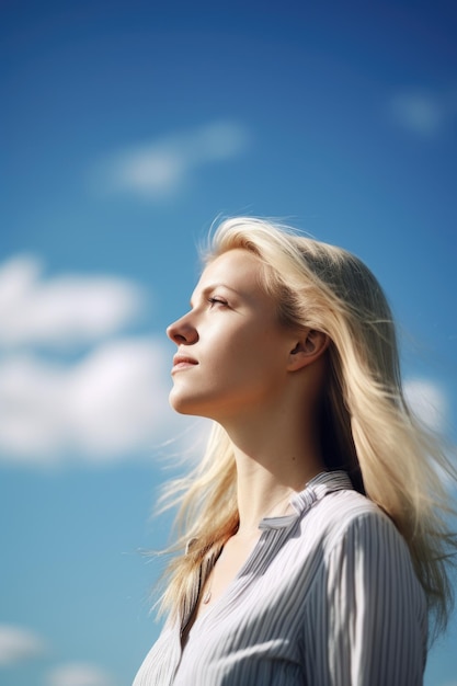 Shot of a young woman standing outside and looking at the blue sky created with generative ai