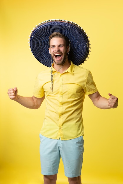 Shouting mexican man in sombrero on background mexican man in sombrero in studio