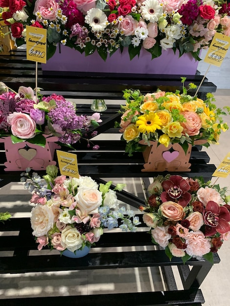 Showcase in a flower shop selection of bouquets for sale retail sale of fresh flowers and floristic compositions