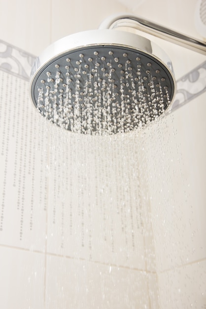 Shower head with drops and streams of water