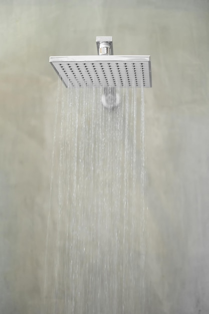 Shower head with wall background in modern bathroom