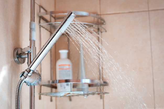 Shower head with wall background in modern bathroom