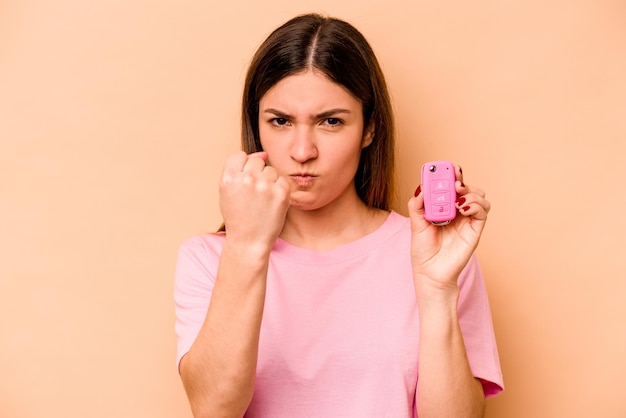 Showing fist to camera aggressive facial expression