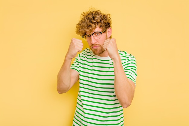 Showing fist to camera aggressive facial expression