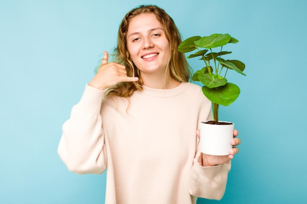 Showing a mobile phone call gesture with fingers