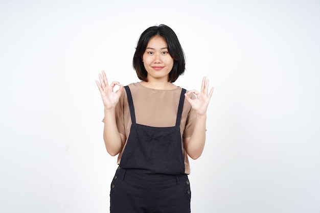 Showing OK Sign of Beautiful Asian Woman Isolated On White Background